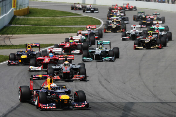 The story of McLaren’s most recent victory at the F1 Canadian Grand Prix Sebastian Vettel leads eventual winner Lewis Hamilton on lap one of the F1 2012 Canadian Grand Prix