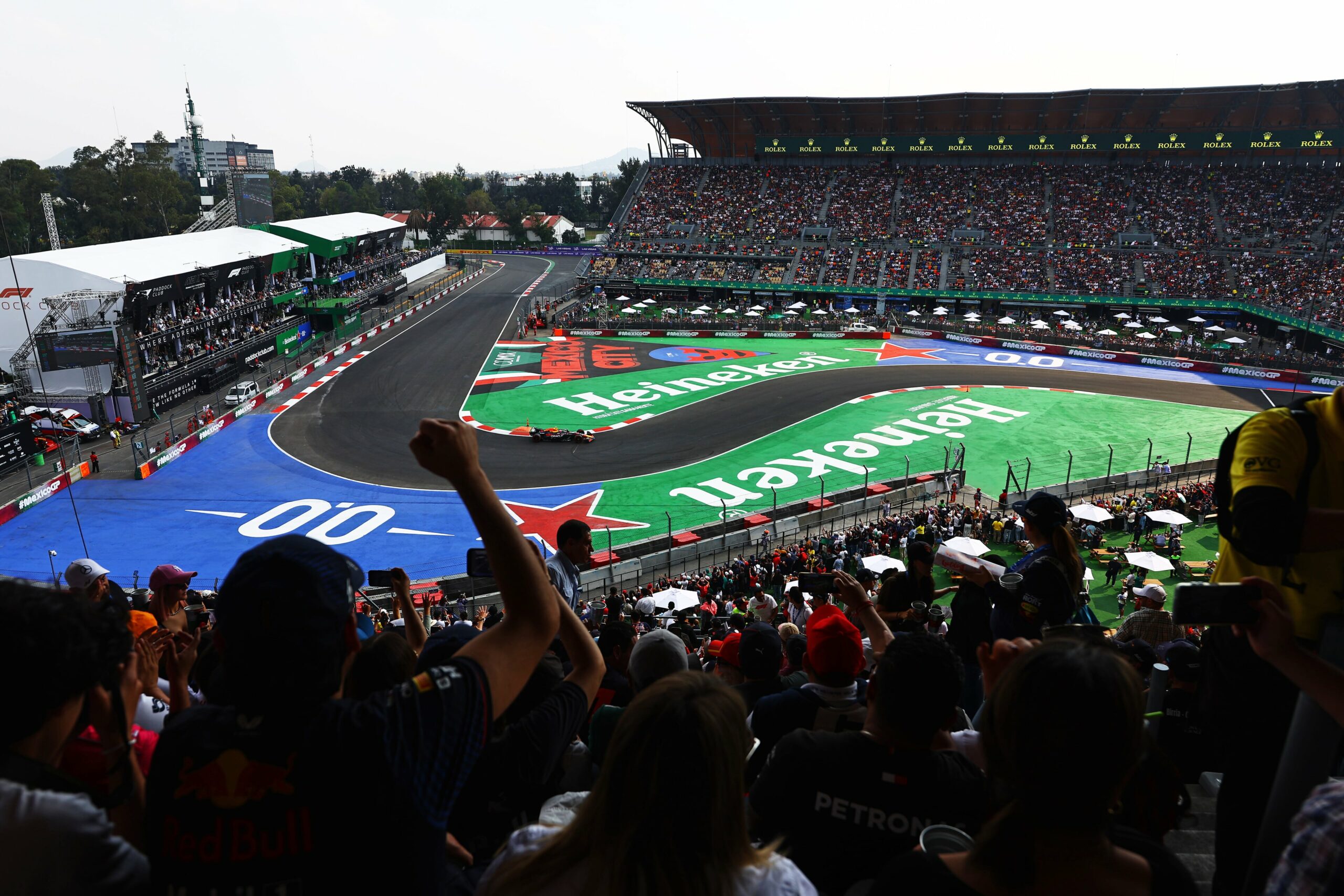 Fans show their support as Sergio Perez of Mexico drives the (11) Oracle Red Bull Racing RB20 on track during qualifying ahead of the F1 Grand Prix of Mexico at Autodromo Hermanos Rodriguez on October 26, 2024 in Mexico City, Mexico