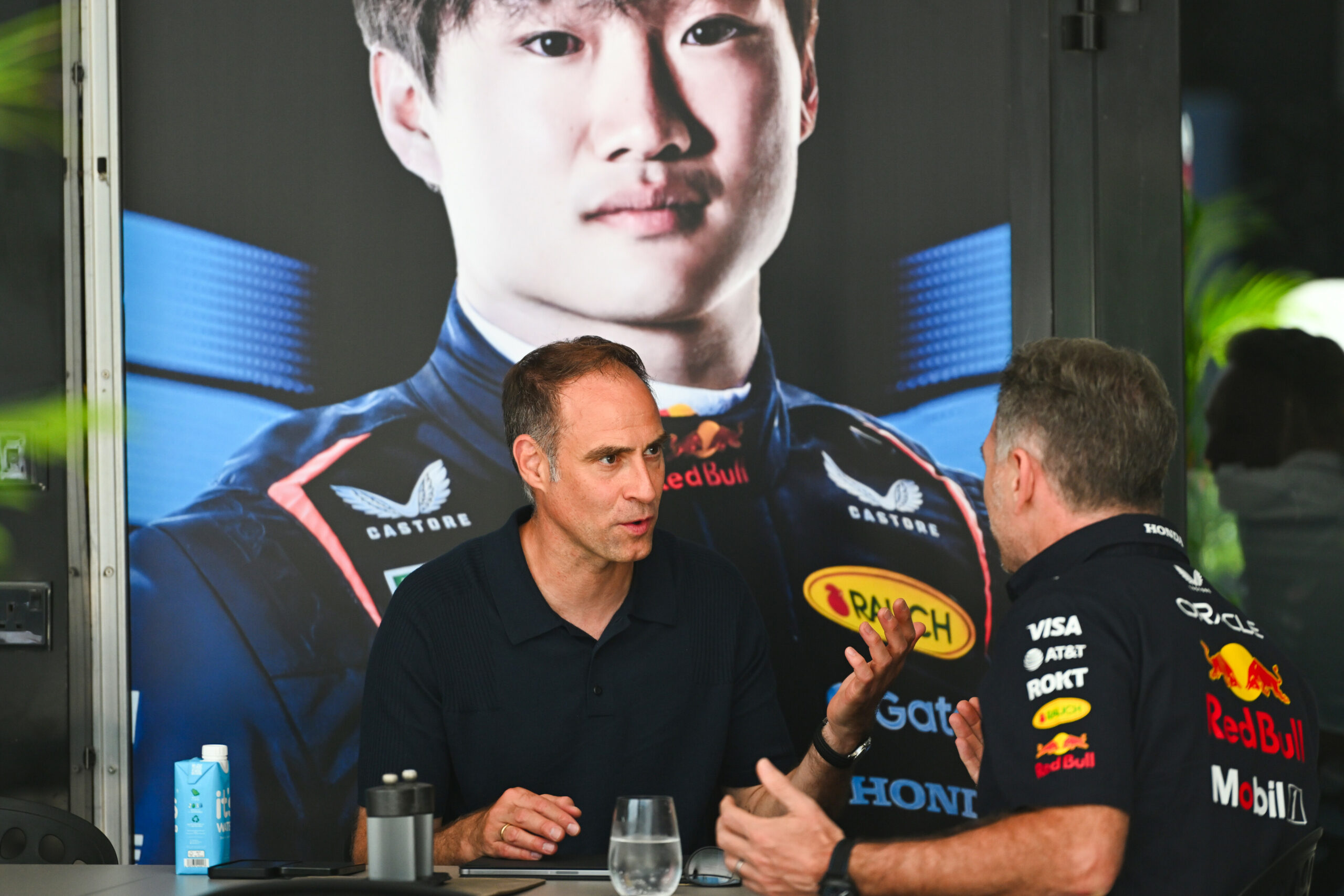 Oliver Mintzlaff speaking with previous TP, Christian Horner, during an F1 event in 2025, before 2026 statements from the German.