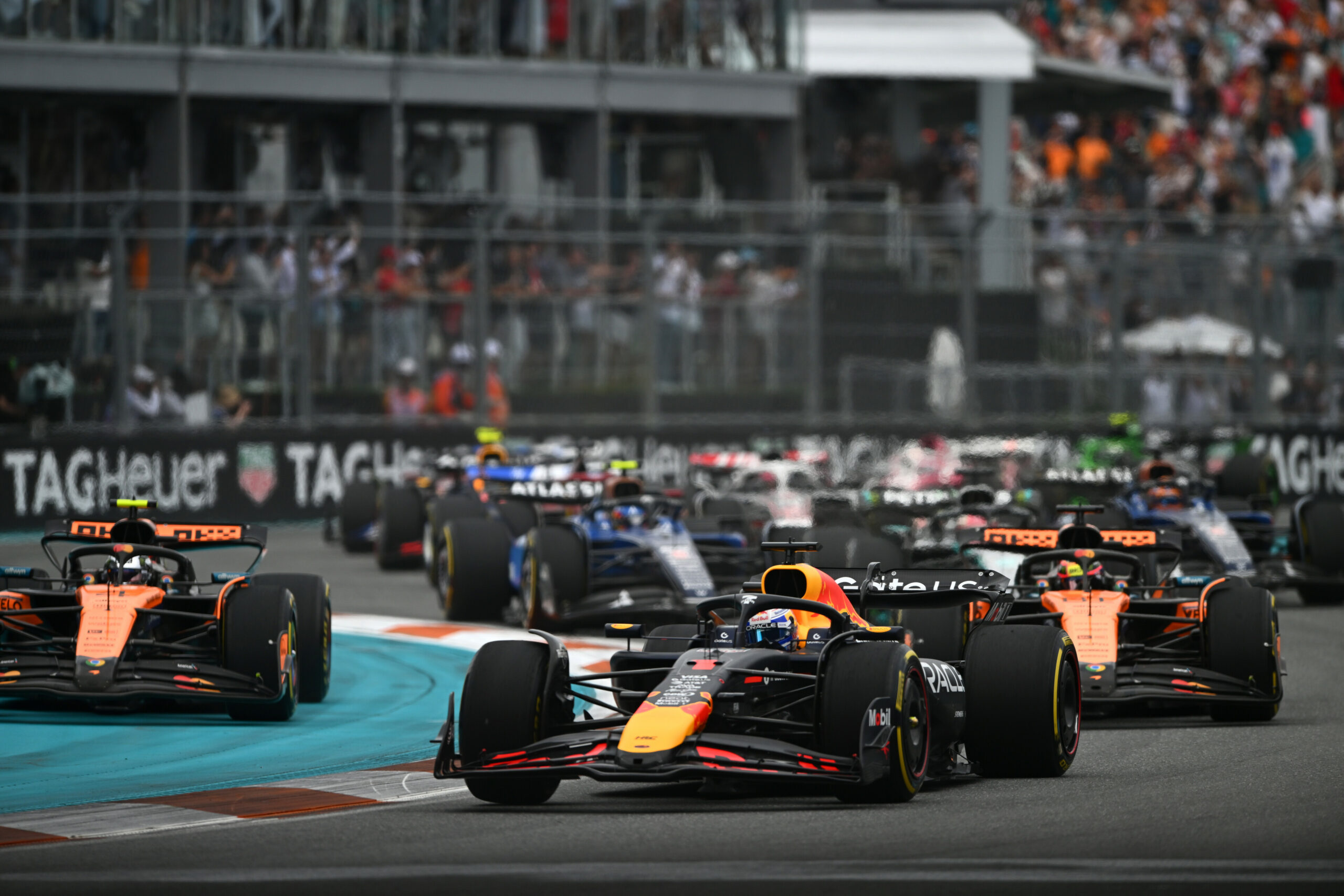 Verstappen in his Red Bull fighting the McLarens at the Miami GP