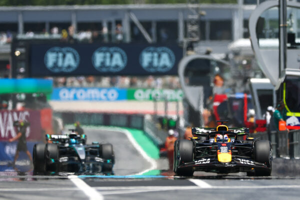 Max Verstappen of Red Bull Racing leads George Russell of Mercedes-AMG F1 at the Spanish Grand Prix