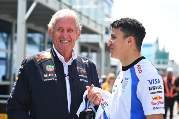 Racing Bulls driver Isack Hadjar speaks with Red Bull advisor Helmut Marko in the paddock during the F1 Canadian GP weekend