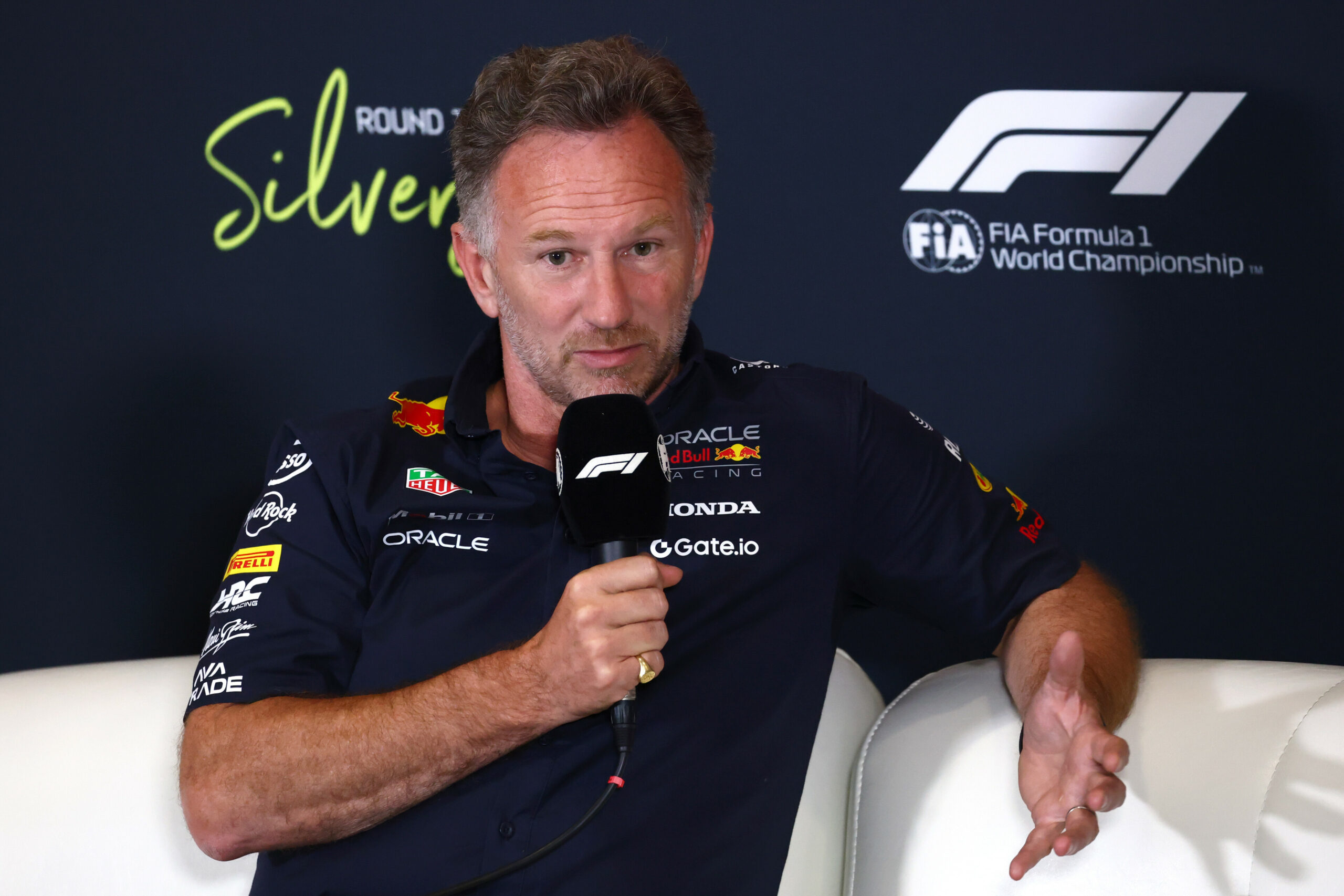 Christian Horner talks about Max Verstappen's tough recovery drive to P5 and Oscar Piastri's penalty at the rain-affected F1 British GP