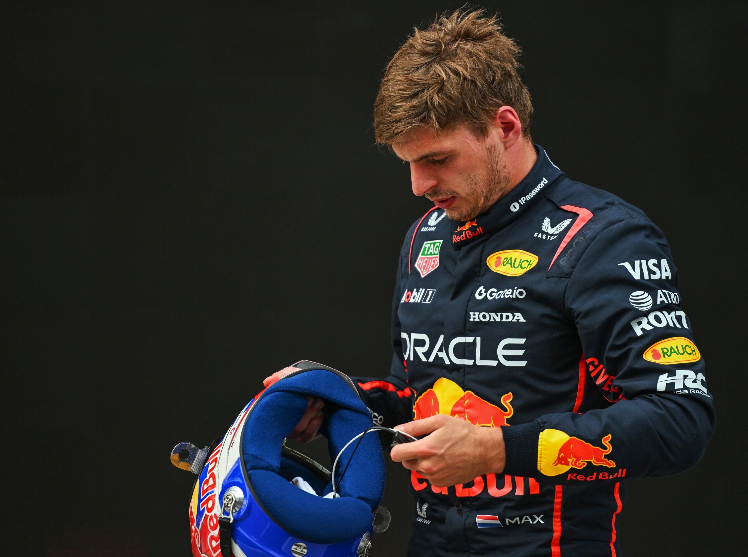 Max Verstappen out of his Red Bull Racing car after the F1 Hungarian GP Qualifying session