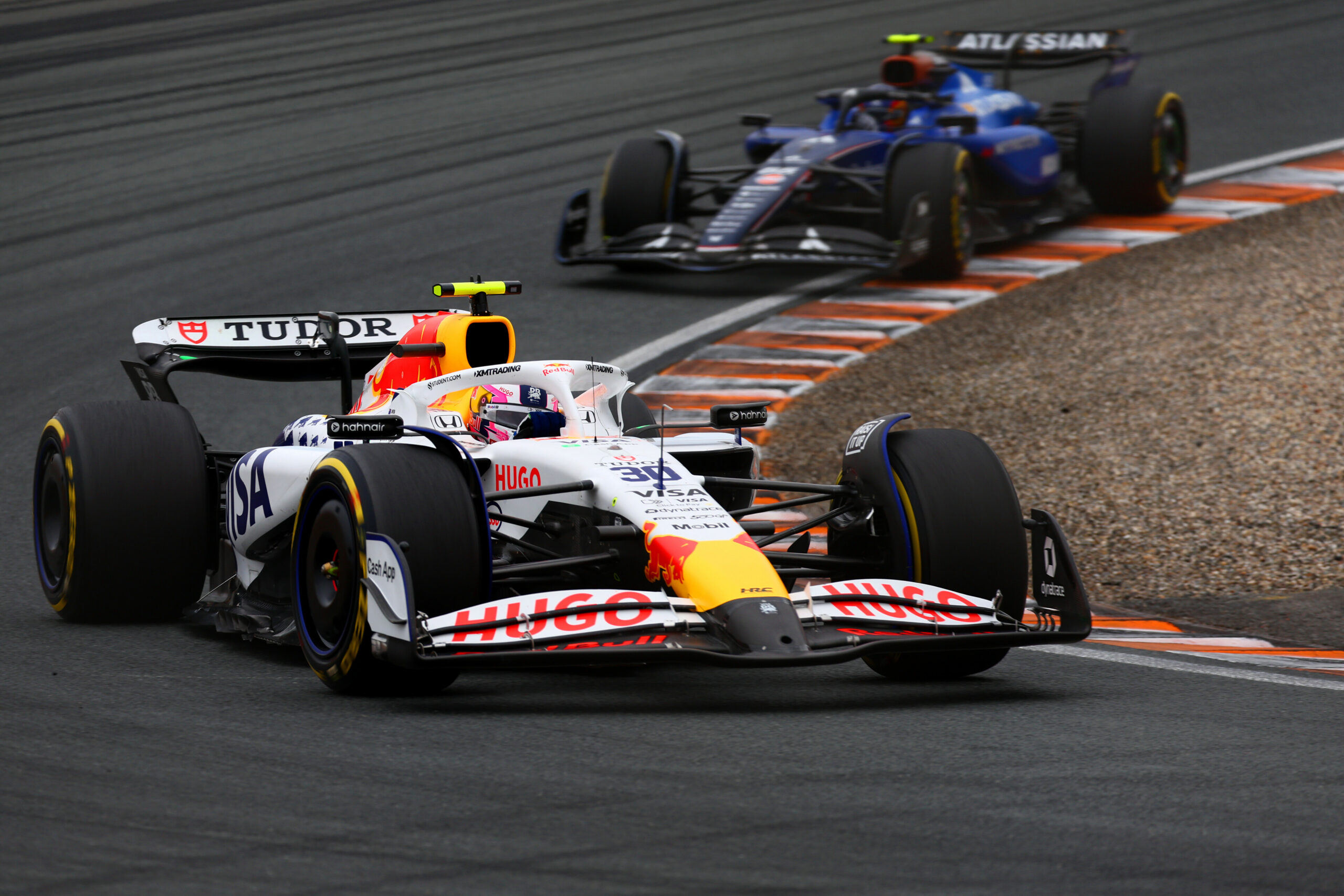 Liam Lawson and Carlos Sainz on track at the 2025 Dutch Grand Prix