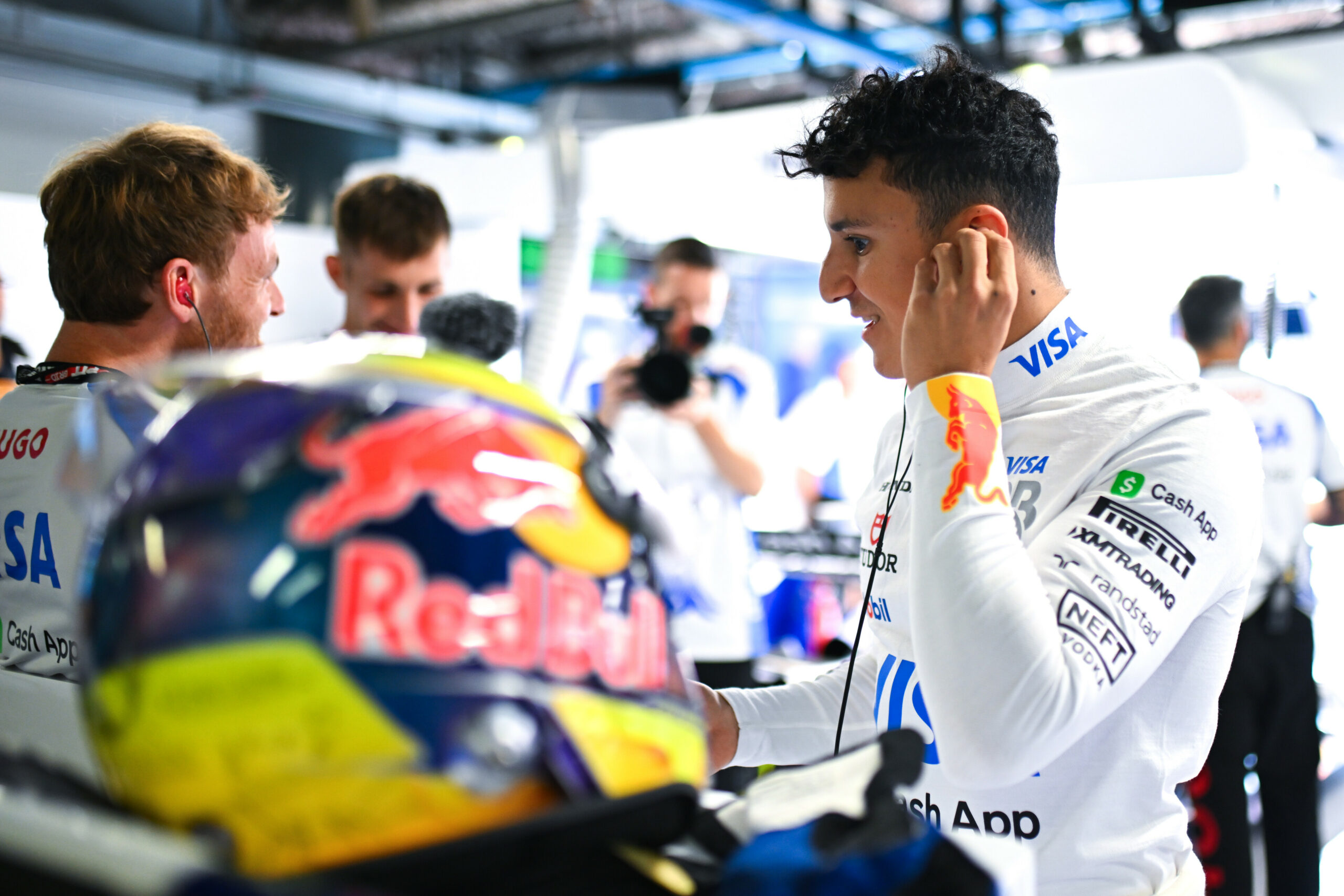 MONZA, ITALY - SEPTEMBER 06: Isack Hadjar of France and Visa Cash App Racing Bulls prepares to drive in the garage during qualifying ahead of the F1 Grand Prix of Italy at Autodromo Nazionale Monza on September 06, 2025 in Monza, Italy. (Photo by Rudy Carezzevoli/Getty Images) // Getty Images / Red Bull Content Pool // SI202509060563 // Usage for editorial use only //