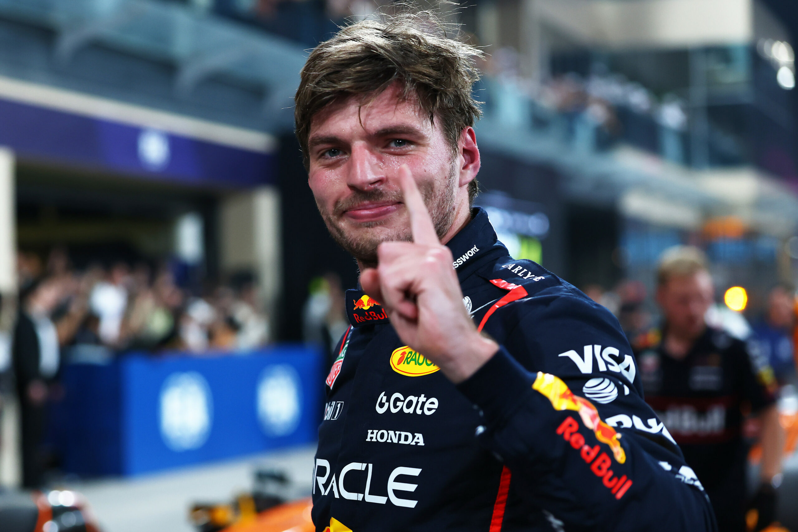 Max Verstappen celebrates after claiming pole for the 2025 F1 Abu Dhabi GP.