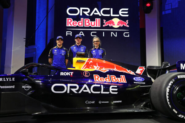 Red Bull Racing's Max Verstappen, Isack Hadjar and Laurent Mekies at the team's 2026 F1 livery reveal event.