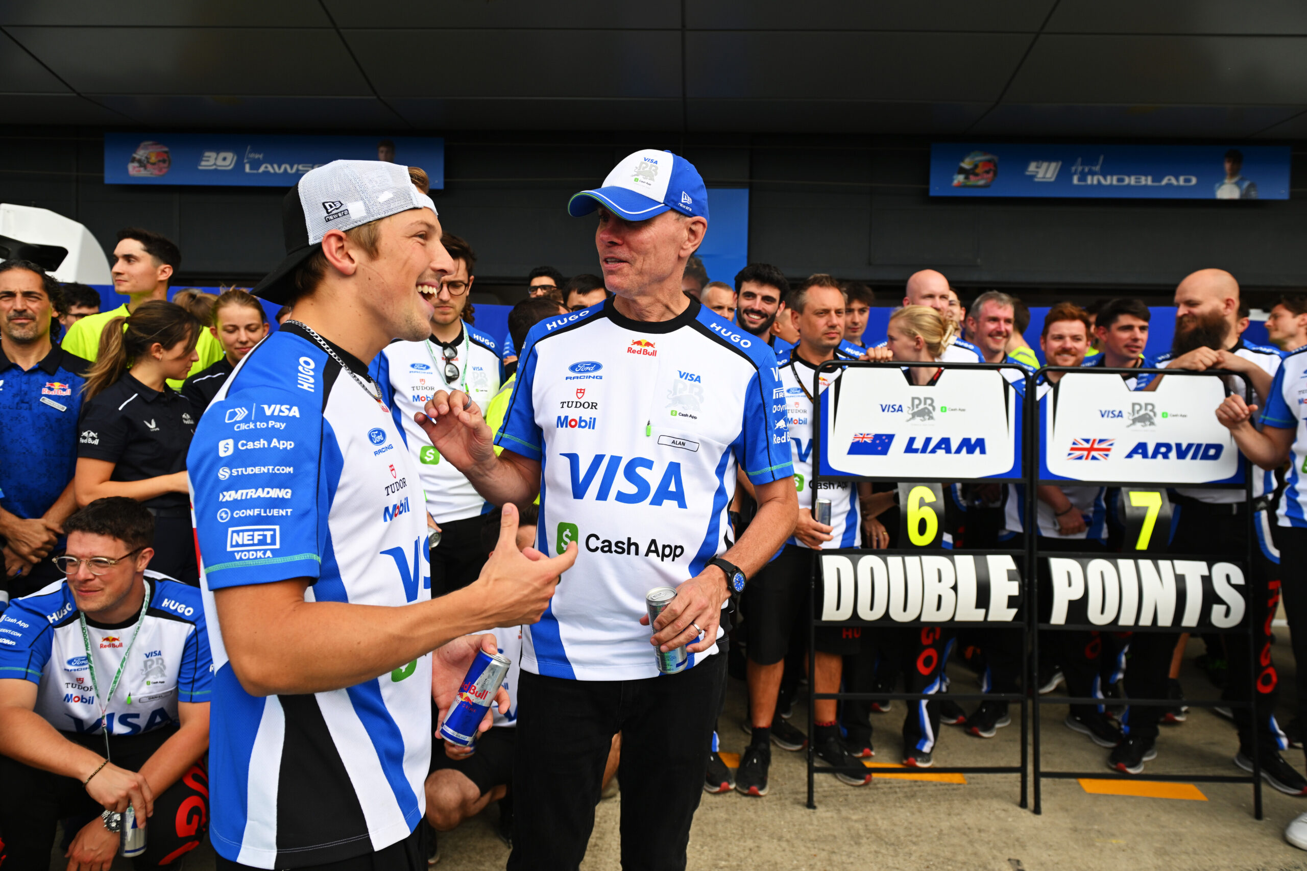 NORTHAMPTON, ENGLAND - JULY 05: Liam Lawson of New Zealand and Visa Cash App Racing Bulls Alan Permane, Team Principal of Visa Cash App Racing Bulls and the Visa Cash App Racing Bulls team celebrate during the F1 Grand Prix of Great Britain at Silverstone Circuit on July 05, 2026 in Northampton, England. (Photo by Rudy Carezzevoli/Getty Images) // Getty Images / Red Bull Content Pool // SI202607050528 // Usage for editorial use only //