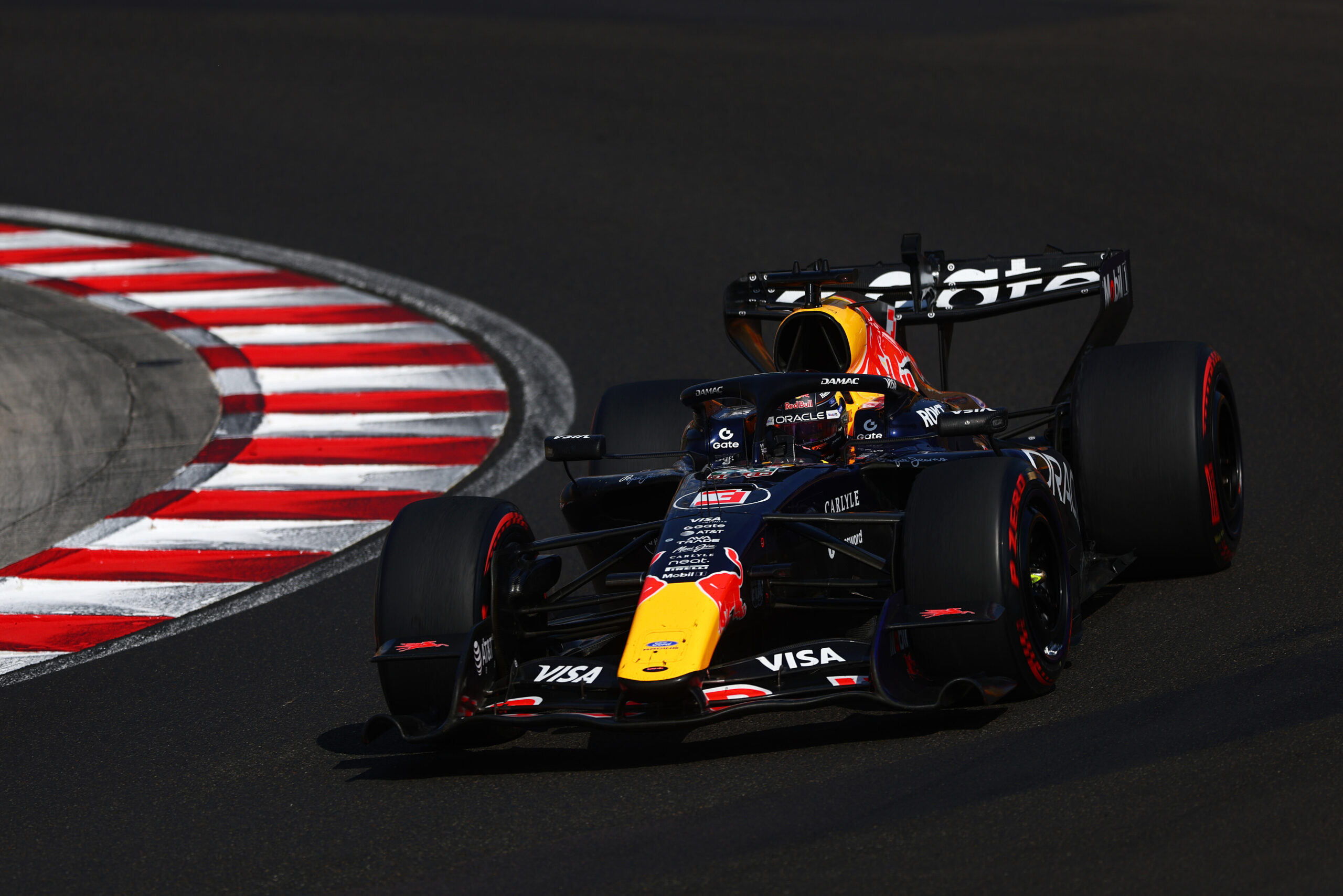 A 2026 Red Bull Racing F1 car driven through a corner at speed. You can read the Mid-Season review here.