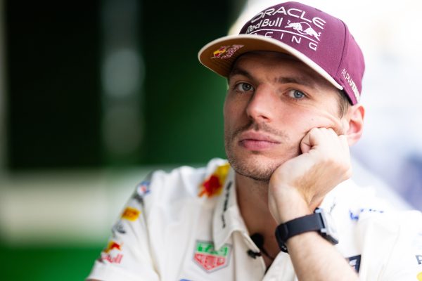Verstappen stresses spinal health risk for F1 drivers caused by “out of control” bumps at COTA AUSTIN, TEXAS - OCTOBER 22: Max Verstappen of the Netherlands and Oracle Red Bull Racing looks on in the Paddock during previews ahead of the F1 Grand Prix of United States at Circuit of The Americas on October 22, 2026 in Austin, Texas. (Photo by Mark Thompson/Getty Images) // Getty Images / Red Bull Content Pool // SI202610230239 COTA F1 Bump