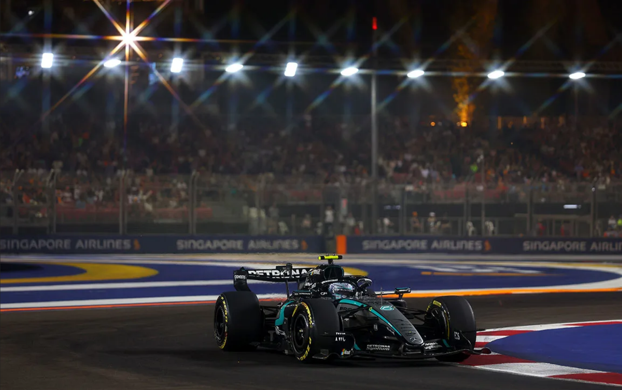 Mercedes face upgrade questions at the 2026 Singapore GP as George Russell secured P2 in the older spec W17 amid Kimi Antonelli's struggles