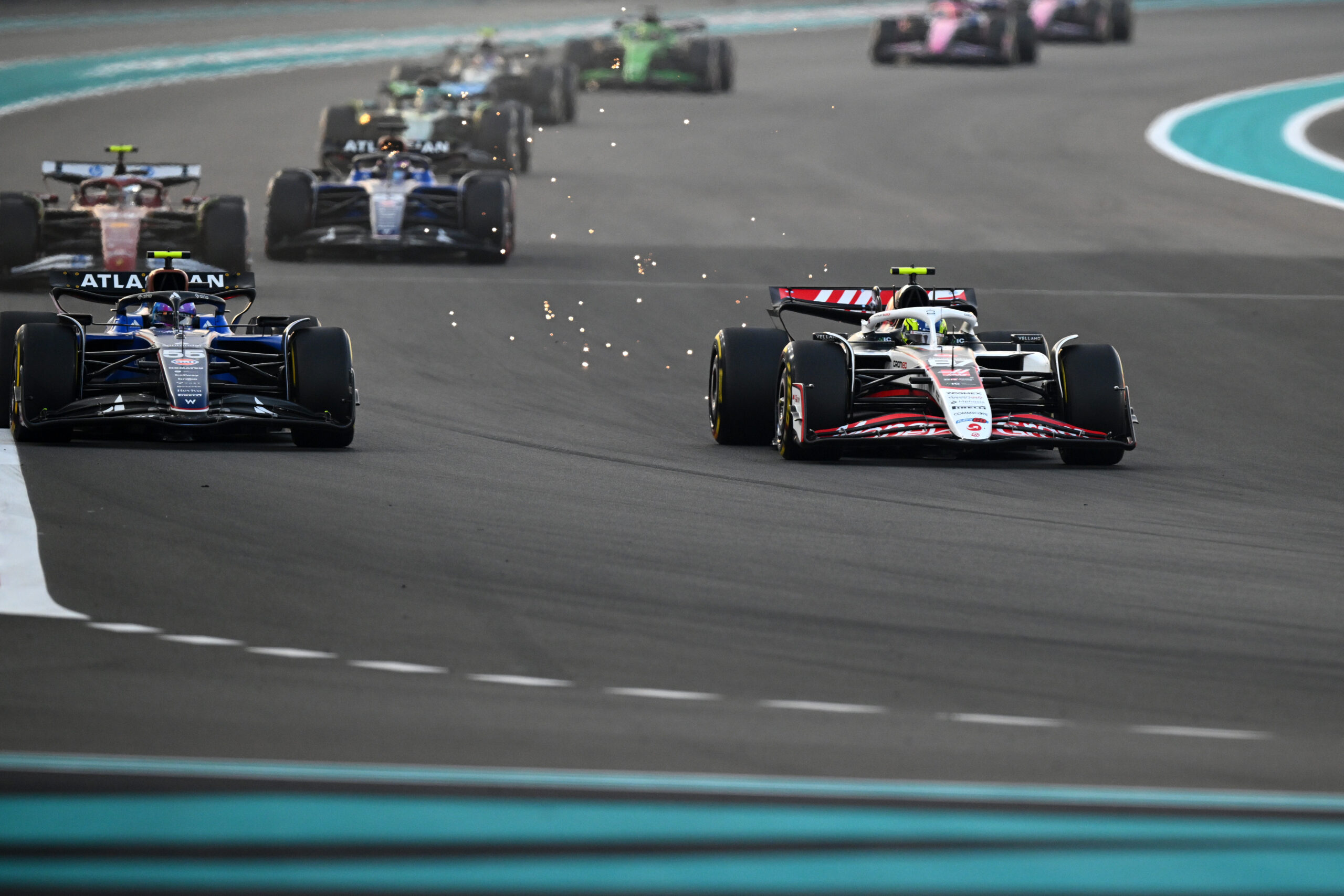 Haas' Oliver Bearman on track at the F1 Abu Dhabi GP before 5-second time penalty for defensive moves against Lance Stroll.