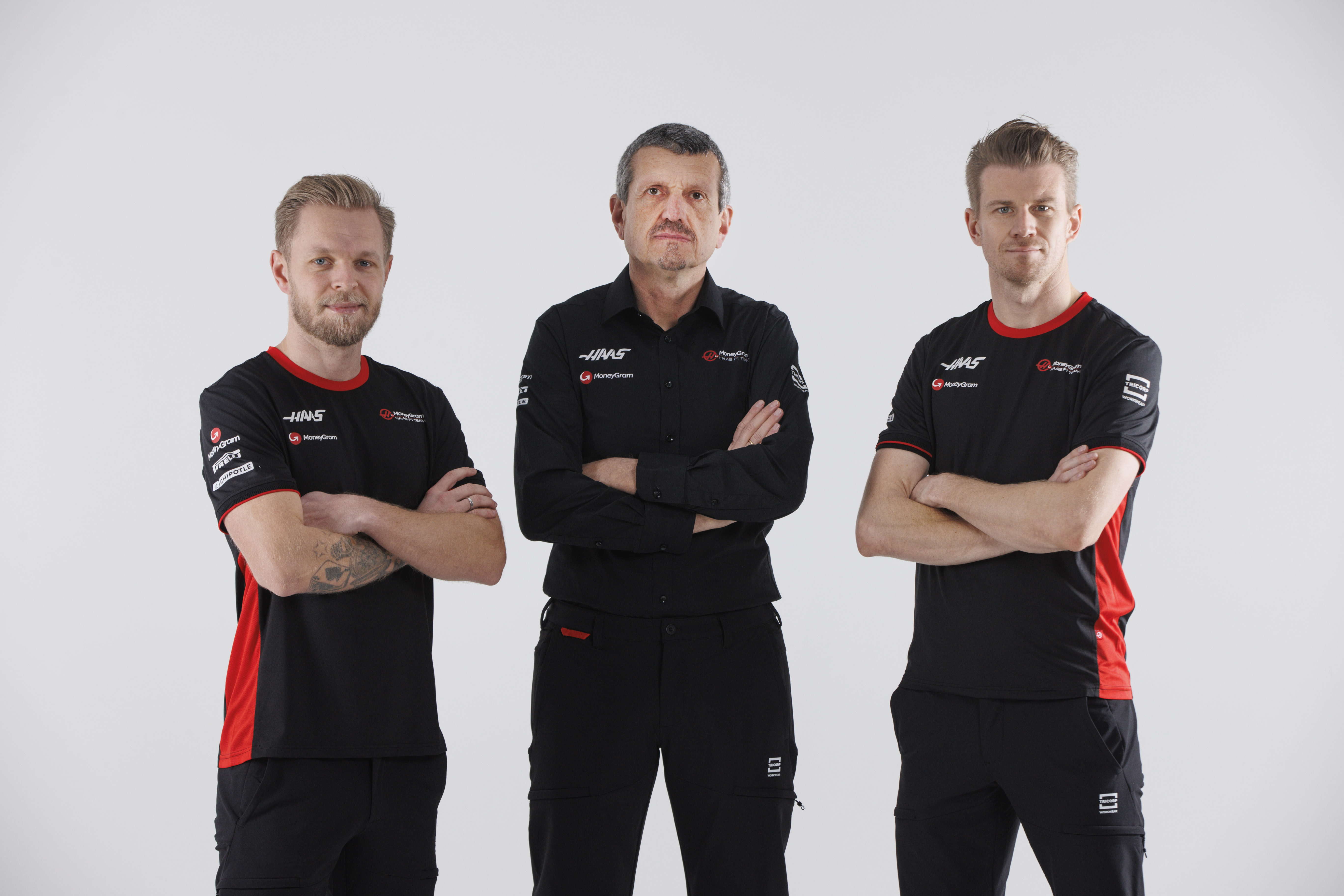 Kevin Magnussen, Guenther Steiner and Nico Hülkenberg
