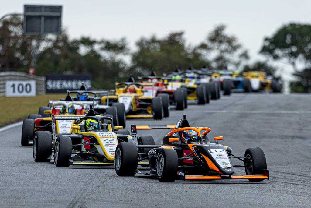 Fausto Arnaudo wins twice on his Brazilian F4 debut at Velocittà as Pedro Lins charges from 13th and Gentil keeps the lead intact.