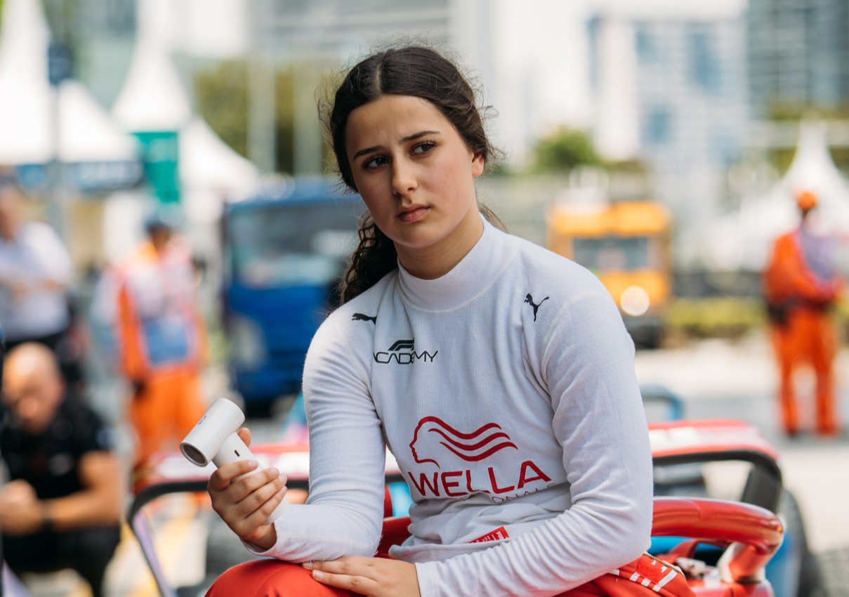 MP Motorsport's Joanne Ciconte with her car ahead of the F1 Academy Bahrain in-season testing (day 2)