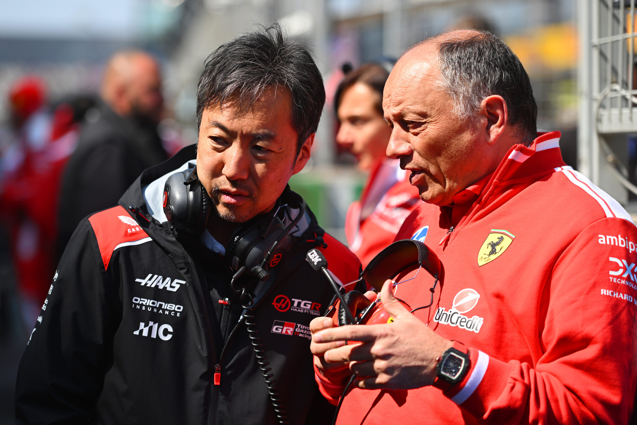 Ayao Komatsu, Haas F1 team principal, speaks to Ferrari's Frédéric Vasseur ahead of the 2026 Chinese GP.