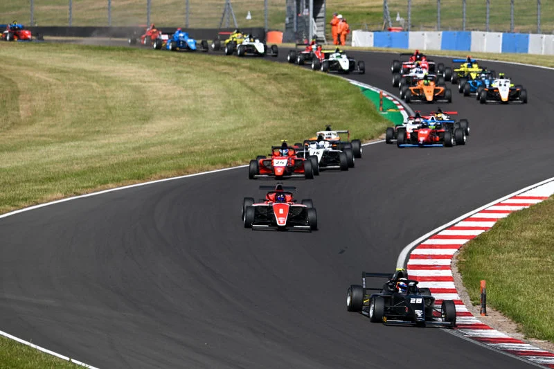 Dayton Coulthard avoids two Safety Cars to win 2026 GB4 Race 2 at Donington as Luke Hilton and Torrin Byrne complete the podium.