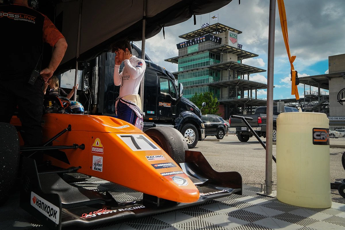 Evagoras Papasavvas overcame a penalty and mechanical trouble to claim three FR Americas podiums at Indianapolis Motor Speedway.