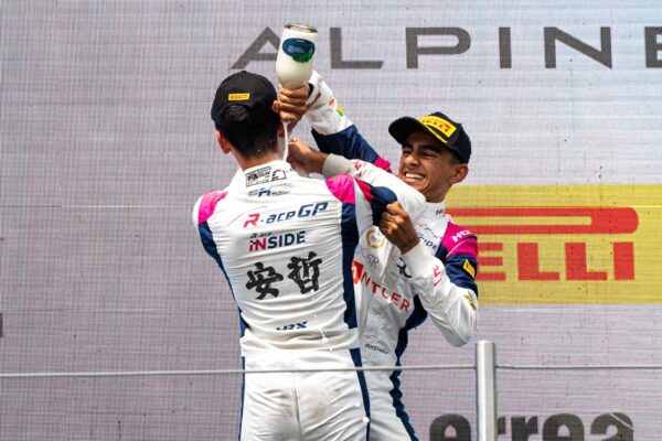 Meet the 2025 FRECA Grid: R-ace GP R-ace GP's Akshay Bohra pouring champagne over teammate Enzo Deligny during FRECA Race 1 podium at Imola.