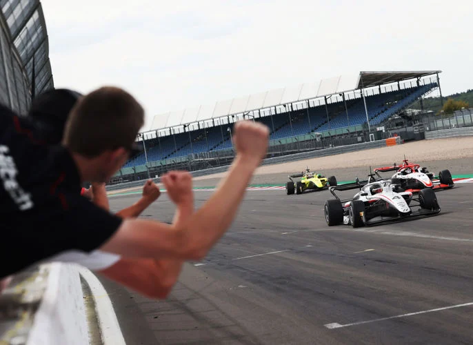 Jacob Micallef snatches a last-lap 2026 GB3 win at Silverstone, passing Rodrigo Gonzalez at Brooklands and Edu Robinson finishes third.