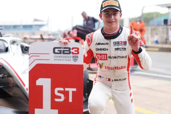Jacob Micallef dedicates his maiden GB3 victory to Malta after a dramatic last-lap pass secured reversed-grid success at Silverstone.