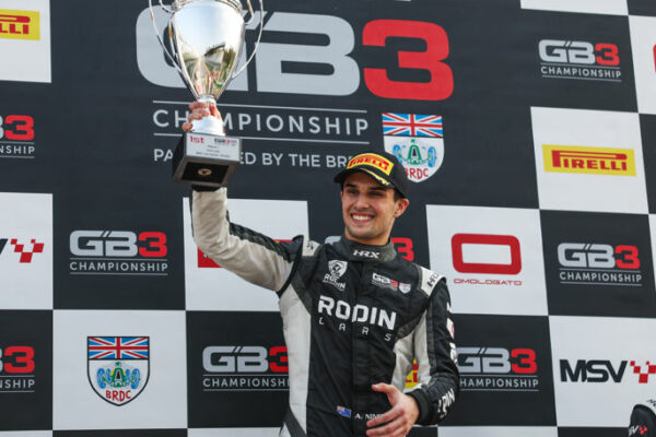 Alex Ninovic holds trophy after Race 1 win at Monza, his 9th of the 2025 GB3 Championship