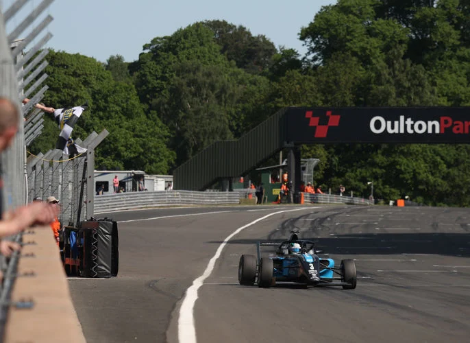 Alex O’Grady claimed his first victory of the 2026 GB4 Championship season at Oulton Park, converting pole position into a controlled Race 2 win for KMR Sport.
