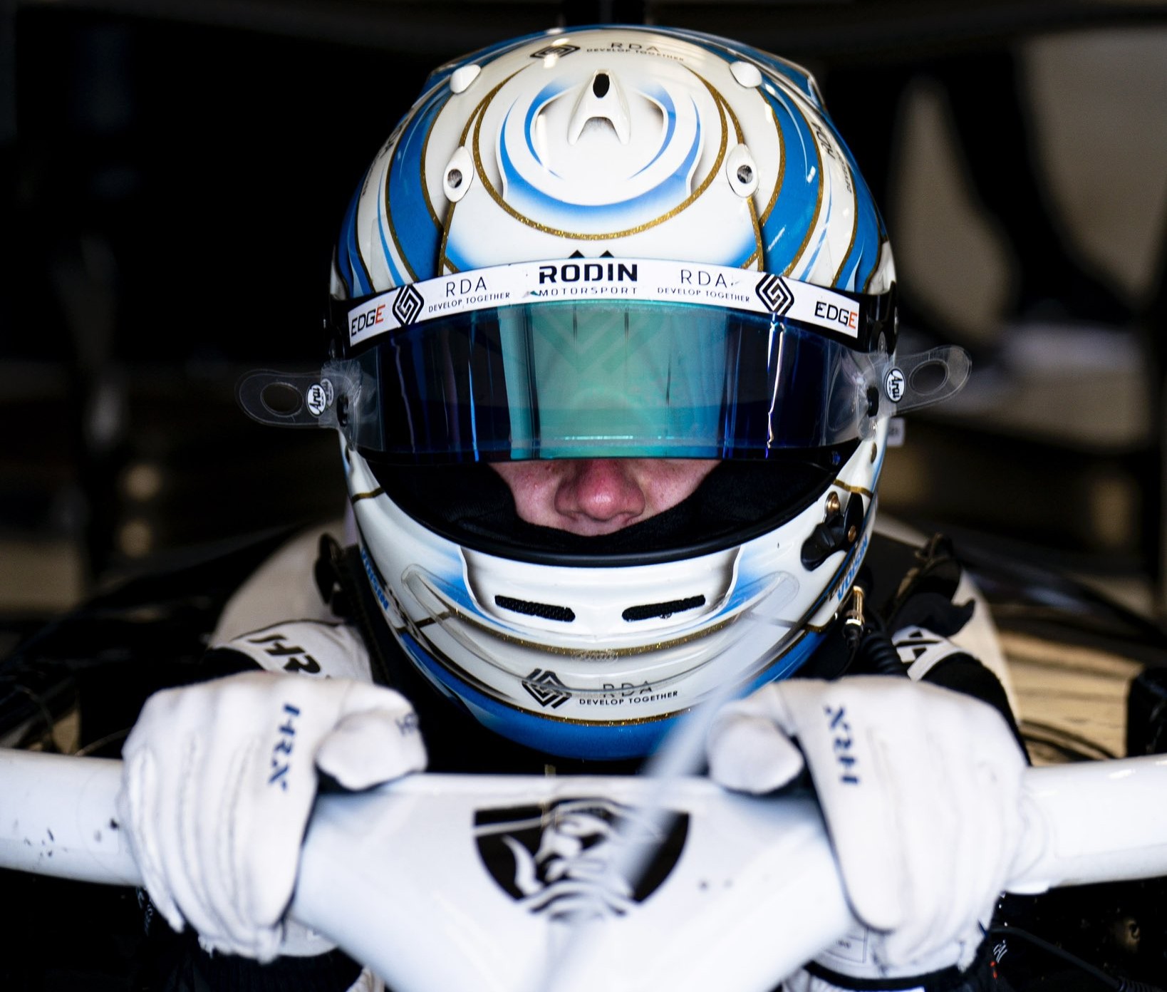 Rodin Motorsport's Callum Voisin getting into his car at the 2025 F3 British GP